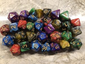 multiple colourful Dungeons and Dragons dice