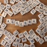 Scrabble tiles spelling Algebra