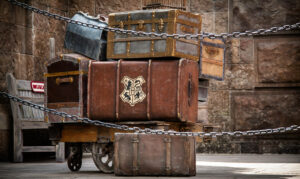 Old suitcases and chests in a pile